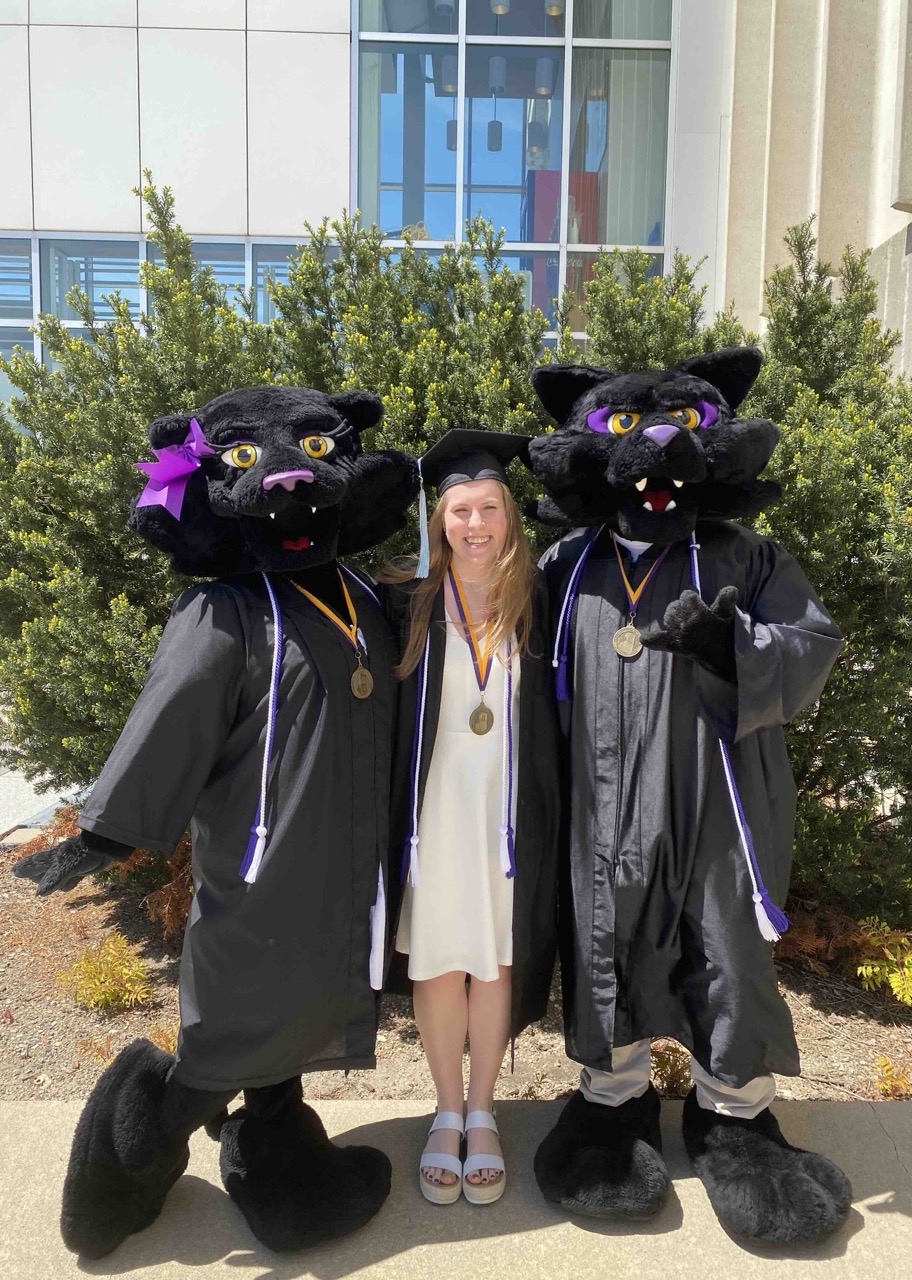 Emily Mars with TC and TK in graduation gowns