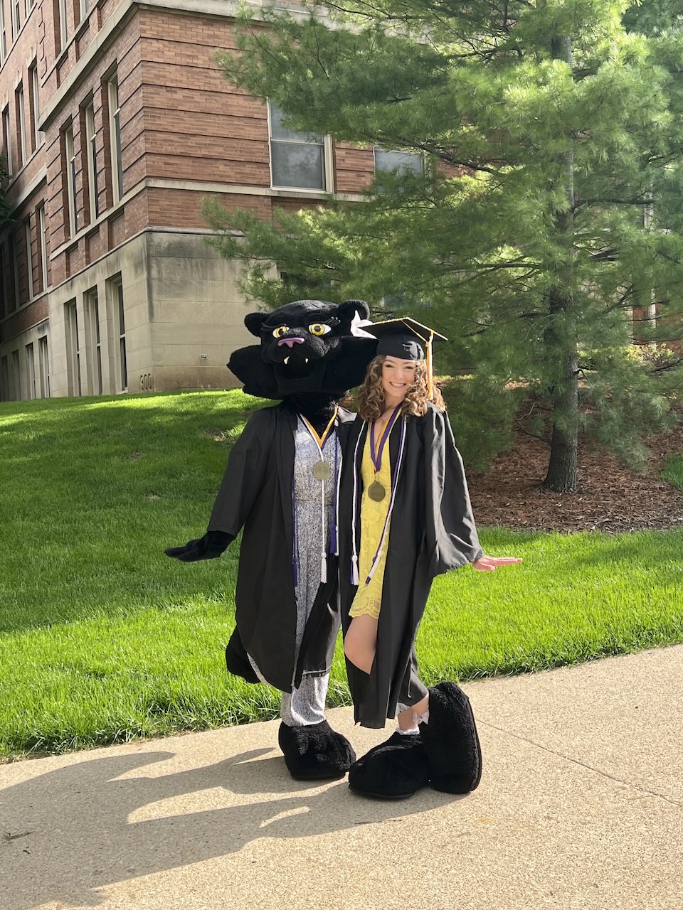 Anna Carmen and TK in graduation gowns