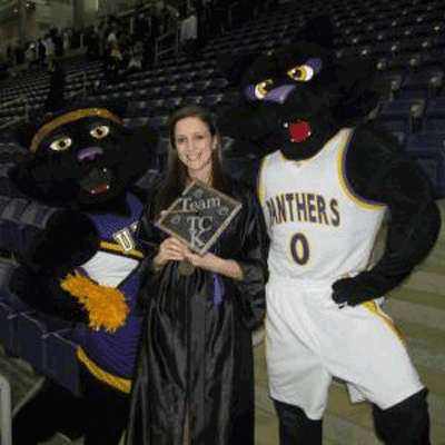 Kristen at graduation between TC and TK